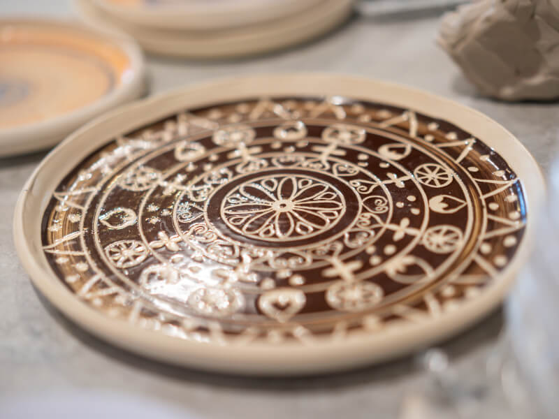 Close up of a fully painting ceramic plate